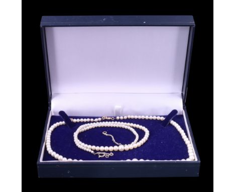 A single-strand necklace of graded pearls, having a 9 ct yellow metal bolt-ring clasp, largest pearl 6 mm, 41 cm, together wi