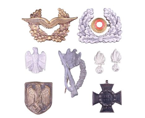 A German Third Reich Honour Cross together with an Army tropical helmet badge etc