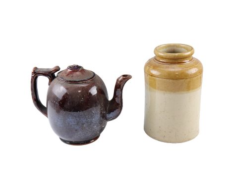 A large Victorian treacle glazed teapot together with a stoneware jar, former 27 cm