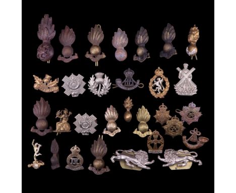 A quantity of British Army collar badges together with a sporran badge