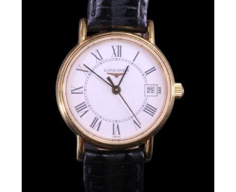 A Longines lady's wristwatch, model L4.136.2, having a quartz movement and white face with Roman numerals and date aperture, 