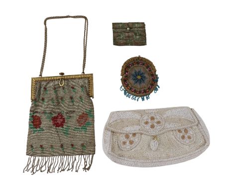 An early 20th century French metallic beadwork evening bag, having a gilt metal cantle and decorated in a floral pattern, cir