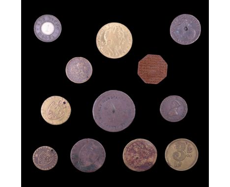 A group of 18th Century Conder, trade and similar tokens including a Victoria One Penny Model, a countermarked Lloyd's Weekly