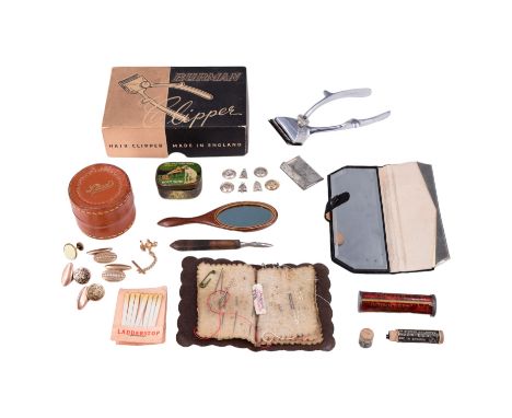 A group of antique and vintage costume, sewing and grooming accessories including an Art Deco purse comb and mirror set, a Be