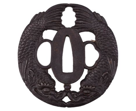 A reproduction Japanese sword tsuba, cast iron