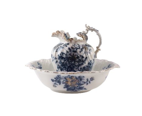 A Victorian / early 20th Century Barkers &amp; Kent Ltd "Montrose" pattern gilt enriched transfer printed blue and white ewer