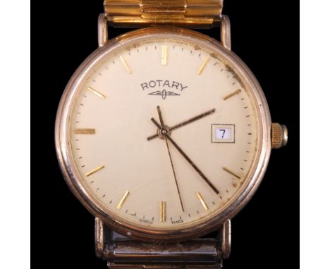 A 9 ct gold Rotary wristwatch having a quartz movement and circular face with gilt baton hands and markers and a date apertur