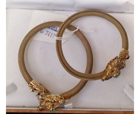 PAIR OF EARLY GILT STERLING SIVER DRAGON BANGLES WITH RUBY/JADE &amp; OTHER STONES
