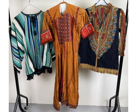 3 vintage ethnic items of clothing. A long line short sleeved jacket with heavily embroidered panel to front. Together with a
