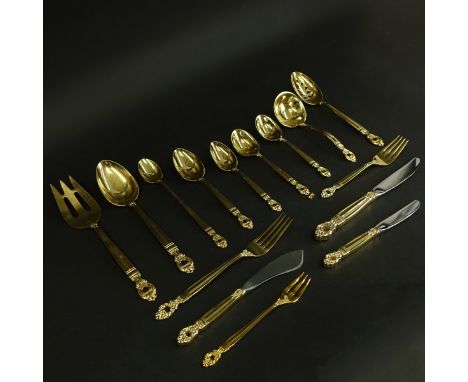 One Hundred Twelve (112) Pieces Towle Monte Cristo Gold Plated Sterling Silver Flatware. The set includes: 11 forks 7-5/8", 1