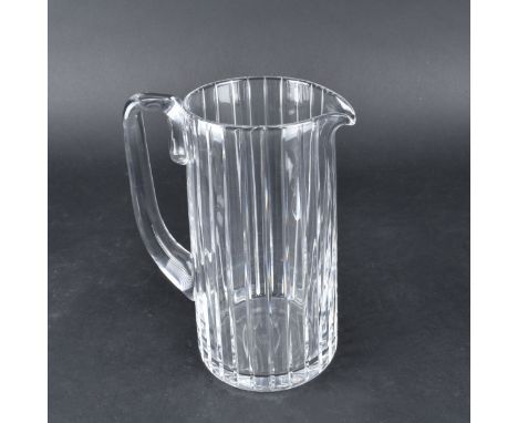 Baccarat "Harmonie" Crystal Pitcher. Signed. Measures 8-3/8" H. Condition: Good condition Estimate: $150.00 - $250.00 Domesti