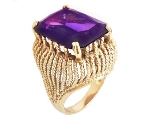 Vintage Amethyst and 14 Karat Yellow Gold Ring. Amethyst with vivid color, measures 20mm x 15mm. Stamped 14K. Ring size 6-1/4