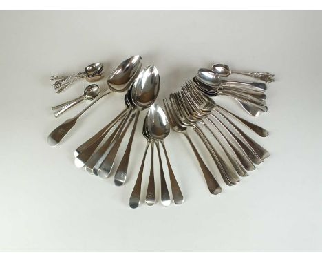 A harlequin collection of silver flatware, various dates and makers, comprising; seven table forks, one dessert fork, seven t