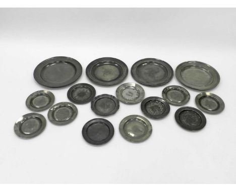 A collection of seven 19th century pewter chargers, approximately 38cm diameter and 21 plates, approximately 24cm diameter, t