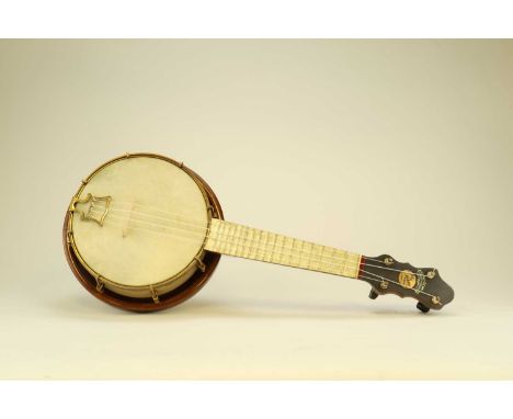 A John Grey banjolele, The Faerie Queen, mid 1920sWith pearlised fretboard, body and back, the headstock with printed label a