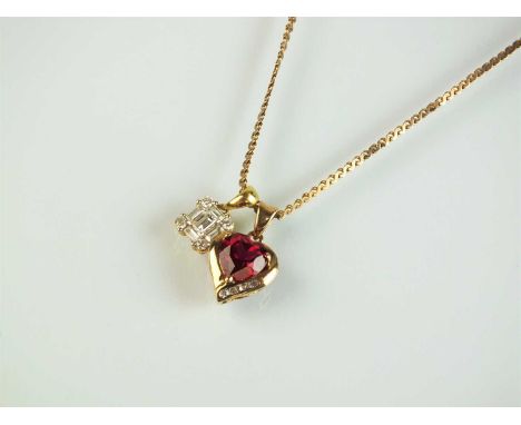 A diamond set pendant, mounted in yellow metal, stamped '750', together with a synthetic ruby set pendant, both suspended fro