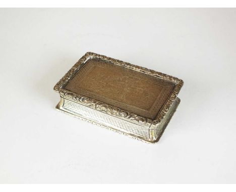 A Victorian silver presentation snuff box, George Unite, Birmingham 1882, of rectangular form with floral cast rim, the centr