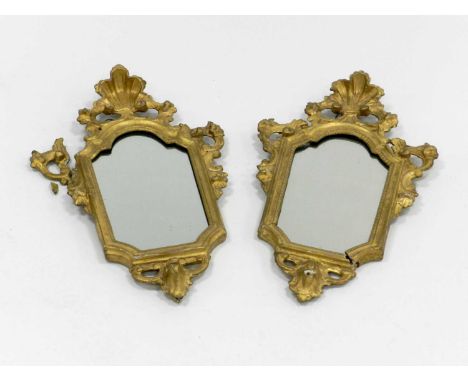A pair of 19th century Italian, gilded wall mirrors, of cartouche form, each base with a moulded mask, 66cm highCondition rep
