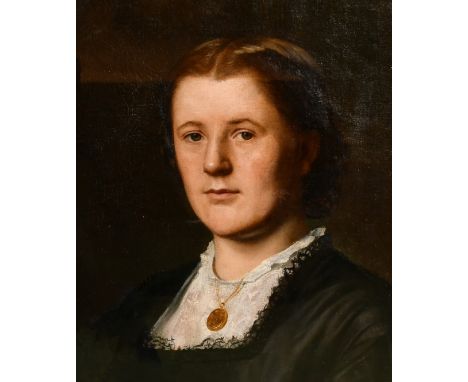 Late 19th Century English School, a portrait of a lady with a gold locket, oil on canvas, 18" x 15" (46 x 38cm).