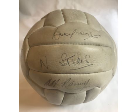 ENGLAND FOOTBALL: A good white leather 'New Excella' football individually signed by fourteen players and officials of the En