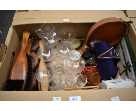 A leather travel case with a selection of items including mens cufflinks, shirt buttons, cigarette lighter and a small geode,