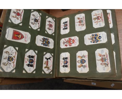 A collection of Wills Cigarettes cards and R J leas cigarette cards.