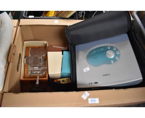 A Canon LV-S1 projector and a selection of projector accessories, a vintage Craig splicer and a small selection of lamps incl