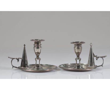  Pair of silver hand candlesticks with English hallmarks - Sizes: H 100mm L 170 mm - Weight (K): 0,66kg - Condition: at first
