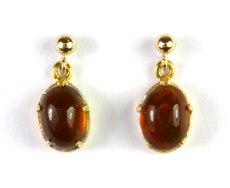 A pair of yellow metal mounted fire opal earrings (no butterflies).