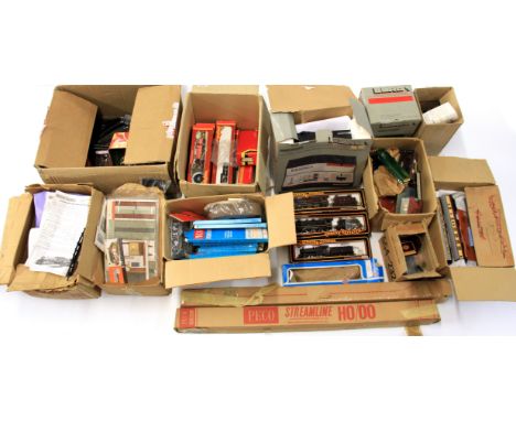 An extensive 00 gauge model railway set including ten locomotives, extensive track, buildings, etc.