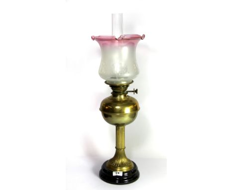 An Edwardian brass oil lamp, H. 65cm.