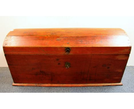 A Victorian dome topped pine trunk with working lock, W. 109cm, Depth. 54cm.