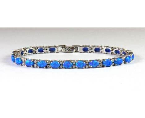 A 925 silver synthetic opal and white stone set bracelet.