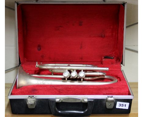 Musical instrument. A cased silver plated cornet.