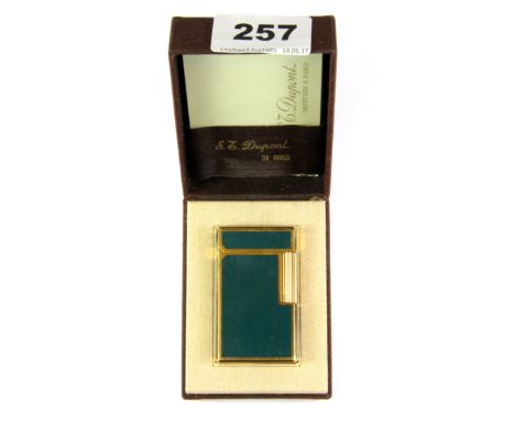 A boxed Dupont green enamelled lighter.