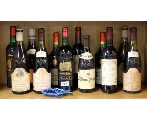 Twelve bottles of vintage red wine. Prov: the wine cellar of Manzi's restaurant London, now closed.