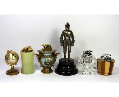 Six vintage table lighters.