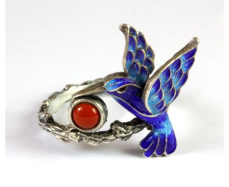 An adjustable 925 silver enamel bird shaped ring set with cornelian.