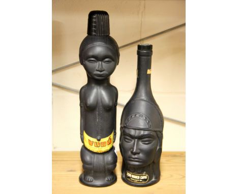 Two vintage liquor bottles.