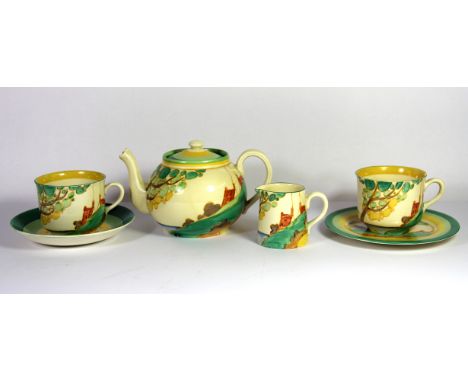 A Clarice Cliff Secret pattern part tea set comprising two cups and one saucer, milk jug, teapot and sandwich plate, (teapot 