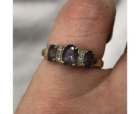 9CT GOLD AMETHYST AND DIAMOND RING SIZE K 1.7G APPROX