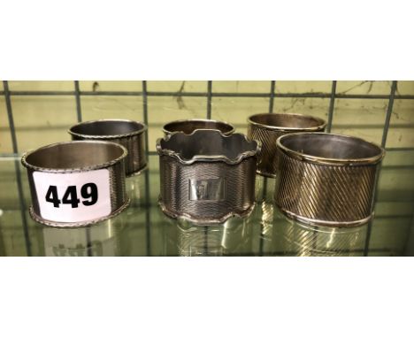 PAIR OF SILVER, TRIO OF SILVER AND A SINGLE SILVER NAPKIN RINGS WITH ENGINE TURNED DECORATION 4.2OZ APPROX