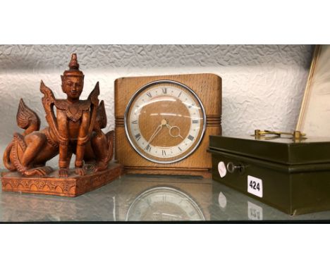 OAK CASED MANTEL CLOCK, GREEN ENAMEL CASH TIN AND A THAI CARVING