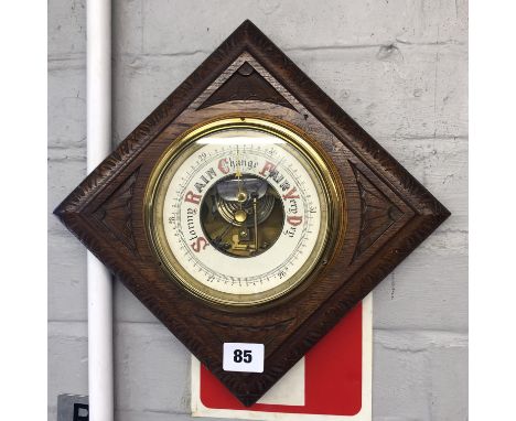 BAROMETER IN A CHIP CARVED LOZENGE PANEL