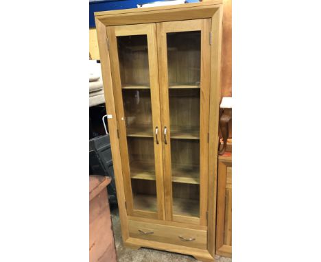 CONTEMPORARY LIGHT OAK GLAZED DOOR TALL CABINET WITH FITTED DRAWER
