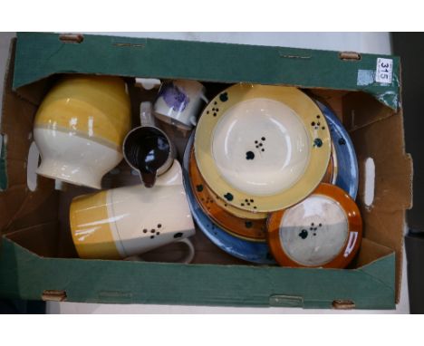 A collection of Poole pottery dinnerware in various colours to include large bowl, vases, water jugs etc (12)