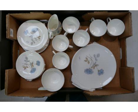 A collection of Wedgwood ice rose tea and dinner ware to include dinner plates, side plates, cups , saucers etc 