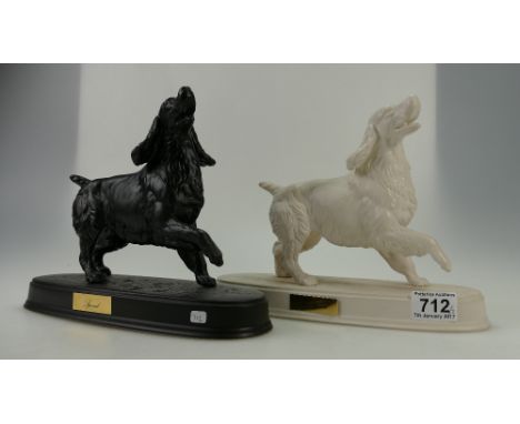 Beswick White Spaniel 2980 on ceramic base together with similar item in Black, both matt. (2)