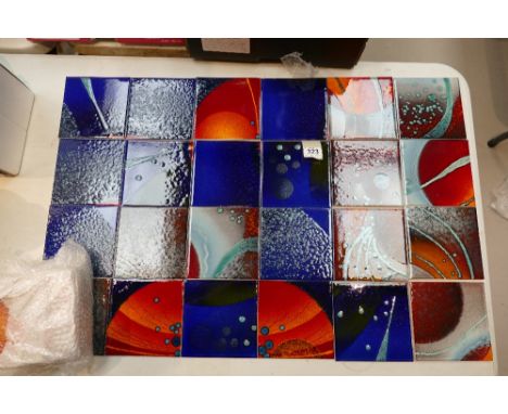 A collection of unmarked heavily glazed unframed tiles credited to Poole pottery (32 in total)