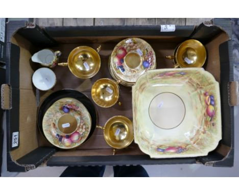 A large collection of Aynsley orchard gold items to include large octagonal fruit bowl, cups, saucers, side plates, milk and 